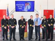 Firefighter of the Year Tomas Diaz Receiving Award